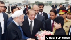 Le président iranien Hassan Rohani à son arrivée à la base d'Islamabad le 25 mars 2016.