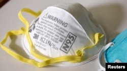 FILE - An N95 respirator mask produced by 3M, pictured in Maplewood, Minn., March 4, 2020. 