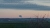 El humo se eleva en la distancia, en medio de informes de dos explosiones, vistas desde Nowosiolki, Polonia, cerca de la frontera con Ucrania el 15 de noviembre de 2022 en esta imagen obtenida de las redes sociales por medio de Stowarzyszenie Moje Nowosiolki, vía Reuters.