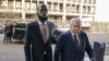 Atis Ayisyen-Ameriken Prakazrel (Pras) Michel ki te manm gwoup Fugees la, ak avoka li David Kenner rive nan tribinal federal Washington nan 30 Mas 2023, pou ouveti pwose li. 