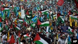 هزاران حامی حزب جماعت اسلامی پاکستان روز یکشنبه بر ضد حملات اسراییل بر نوار غزه مظاهره کردند