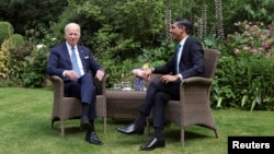 British Prime Minister Rishi Sunak meets with U.S. President Joe Biden at 10 Downing Street in London, July 10, 2023, 