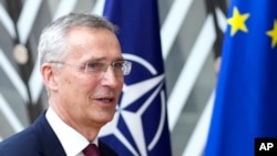 FILE - NATO Secretary-General Jens Stoltenberg arrives for an EU summit at the European Council building in Brussels, June 29, 2023. 