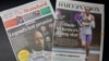 Vue générale des couvertures de deux journaux kenyans, The Standard et Daily Nation, avec des hommages au recordman du monde du marathon Kelvin Kiptum, à Nairobi le 13 février 2024. (Photo by SIMON MAINA / AFP)