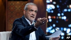 FILE - Masoud Pezeshkian, now Iran's president-elect, is pictured at a candidates debate in Tehran, June 17, 2024, in this picture made available by Iranian state-run IRIB TV.