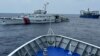 中国海警船和民兵船（图右上）在菲律宾近海的第二托马斯浅滩（仁爱礁）海域阻拦菲律宾海岸警卫队巡逻船。（2023年10月4日）
