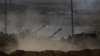 Lame Izrayelyen an tire sou fwontye Gaza a, 31 Oktob, 2023. 