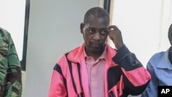 FILE - Preacher Paul Mackenzie arrested two weeks ago for asking his followers to starve to death in order to meet Jesus, appears in court in Malindi, Kenya, May 2, 2023.