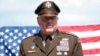 ARCHIVO - El general del ejército Mark Milley, presidente del Estado Mayor Conjunto, asiste a una entrevista con Associated Press en el cementerio estadounidense de Colleville-sur-Mer, con vista a la playa de Omaha, el 6 de junio de 2022.