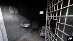 FILE - A replica of Russian opposition leader Alexei Navalny's jail cell from last year that was installed on a square near the Louvre Museum in Paris is pictured on March 14, 2023. (AP Photo/Thomas Padilla, File)
