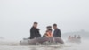 Pemimpin Korea Utara Kim Jong Un dan Perdana Menteri Kim Tok Hun mengunjungi daerah yang terkena banjir di dekat perbatasan dengan China, di Provinsi Pyongan Utara, 31 Juli 2024. (Foto: via Reuters)