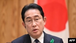 Japans Prime Minister Fumio Kishida answers questions during a group meeting with the foreign media at the prime ministers official residence on April 20, 2023. (Photo by Kazuhiro NOGI / AFP)