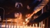 FILE - Pakistanis light candles for journalists killed in a targeted suicide bombing, to mark World Press Freedom Day, in Quetta on May 3, 2018. Media freedom advocates are expressing outrage this week, as Pakistan recorded its eighth journalist killing so far in 2024.