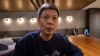 In this image taken from video footage run by TVBS, Chinese dissident Chen Siming speaks during an interview at Taoyuan International Airport's transit lounge in Taipei, Sept. 22, 2023. 