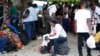 Ayisyen kap tann avyon pou al Nikaragwa rasanble apre gouvenman an te entedi tout vol charter ki pral Nikaragwa, nan ayeropo entenasyonal Toussaint Louverture la nan Potoprens, Ayiti, 30 Oktob, 2023. 