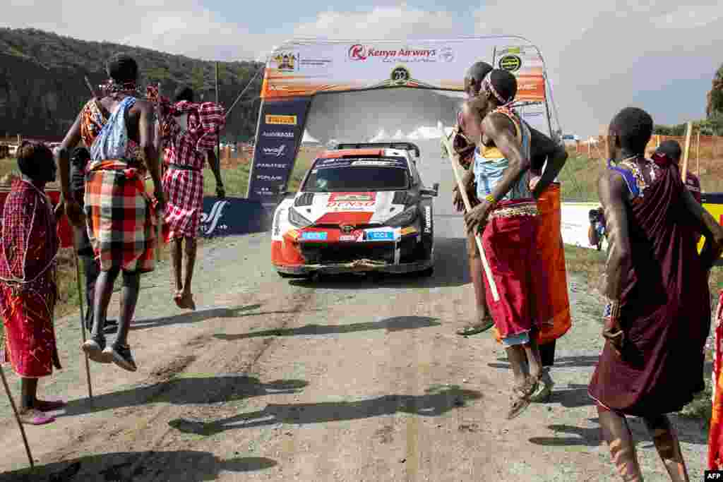 French rally team of driver Sebastian Ogier and his co-driver Vincent Landais arrive to pomp at the finish line to win the WRC Safari Rally Kenya, part of the FIA World Rally Championship in their Toyota Gr Yaris Rally1 Hybrid at the lake-side town of Naivasha, June 25, 2023. 
