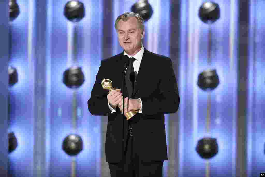 This image released by CBS shows Christopher Nolan accepting the award for best director for "Oppenheimer" during the 81st Annual Golden Globe Awards in Beverly Hills, Calif., on Jan. 7, 2024.