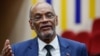 Perdana Menteri Haiti Ariel Henry berbicara kepada mahasiswa saat kuliah umum di Universitas Internasional Amerika Serikat (USIU) Afrika, di Nairobi, 1 Maret 2024. (Foto: AFP)