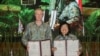 Menteri Lingkungan Hidup dan Kehutanan Siti Nurbaya (kanan) dan Menteri Negara untuk Asia, Energi, Iklim, dan Lingkungan Hidup Inggris, Lord Goldsmith, menandatangani kerja sama di bidang lingkungan dan iklim di Jakarta, pada 22 Oktober 2022. (Foto: Kemen