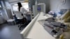 FILE - Laboratory instruments are seen at the Cell2B biomedical company near Lisbon December 18, 2012. Cell2B is preparing for clinical trials of promising cell therapies aimed at eliminating transplant rejection in humans, after which the founders do not