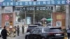 A convoy of vehicles, one of them carrying K-pop band BTS's member Jin arrive at an army training center in Yeoncheon, South Korea, Dec. 13, 2022. 
