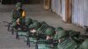 Army reservists take part in a shooting exercise at a base in Nanshipu, Taiwan, March 12, 2022.