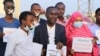 FILE - Somali journalists protest in support of an imprisoned colleague. (Twitter @sjs_Somalia)