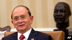 In front of a bust of Martin Luther King, Jr., Burma President Thein Sein meets with President Barack Obama, not pictured, the White House, Washington, May 20, 2013.