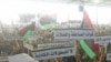 Members of the Libyan National Army rally to call for the National Transitional Council to stop marginalizing the role of the national army in Benghazi, Libya, March 4, 2012. 