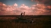 Ukrainian servicemen stand on top a Ukrainian tank near the recently retaken village of Borova, east Ukraine, Oct. 7, 2022.