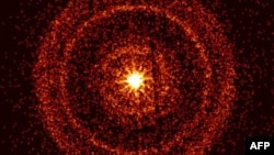This picture provided by NASA on Oct. 14, 2022, shows the Swift Observatory's view of the afterglow of a burst of gamma rays about an hour after it was first detected. 