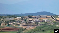 FILE - A Sept. 28, 2012, photo shows the private compound homestead of South African President Jacob Zuma in Nkandla, in the northern KwaZulu Natal province South Africa.