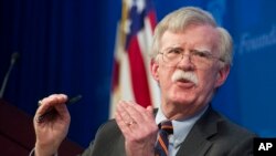Penasihat Keamanan Nasional AS John Bolton memaparkan kebijakan AS di Afrika dalam sebuah acara di Heritage Foundation di Washington, 13 Desember 2018.