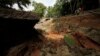 A view of a portion of a damaged highway in Getafe, Bohol, a day after an earthquake hit central Philippines, Oct. 16, 2013.