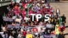 ARCHIVO - Inmigrantes se manifiestan pidiendo permisos de trabajo para los programas de Acción Diferida para los Llegados en la Infancia (DACA) y Estatus de Protección Temporal (TPS) en Franklin Park en Washington, el 14 de noviembre de 2023.