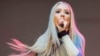 Amethyst Amelia Kelly, also known as Iggy Azalea, performs during Music Midtown 2014 at Piedmont Park in Atlanta, Sept. 19, 2014.
