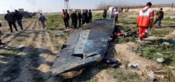 General view of the debris of the Ukraine International Airlines, flight PS752, Boeing 737-800 plane that crashed after take-off from Iran's Imam Khomeini airport, on the outskirts of Tehran, Iran Jan. 8, 2020.