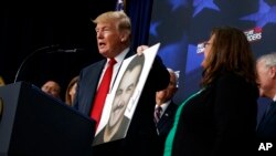 President Donald Trump speaks about immigration alongside family members affected by crime committed by undocumented immigrants, at the South Court Auditorium in the White House complex, June 22, 2018, in Washington.