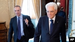 L'ancien haut responsable du Fonds monétaire international, Carlo Cottarelli, au Palais du Quirinal à Rome, en Italie, le 29 mai 2018 pour une rencontre avec le président italien Sergio Mattarella.