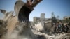Israeli Missiles Strike Gaza Apartment and Office Tower