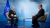 Admiral James Stavridis (L), Supreme Allied Commander Europe, during an interview with VOA's Al Pessin at NATO Headquarters in Brussels, Belgium, April 23, 2013. (NATO)