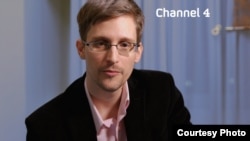 FILE - Edward Snowden is seen delivering his "Alternative Christmas Message" on Britain's Channel 4. (Channel 4)