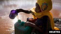 FAAYILII - Daa'ima umuriin 10, Dansaa Tadichaa yeroo ongeen hammmaatetti bakka horiin dhuguu yeroo bishaan waraabdu, Moyaalee, Waxabajjii 12, 2009