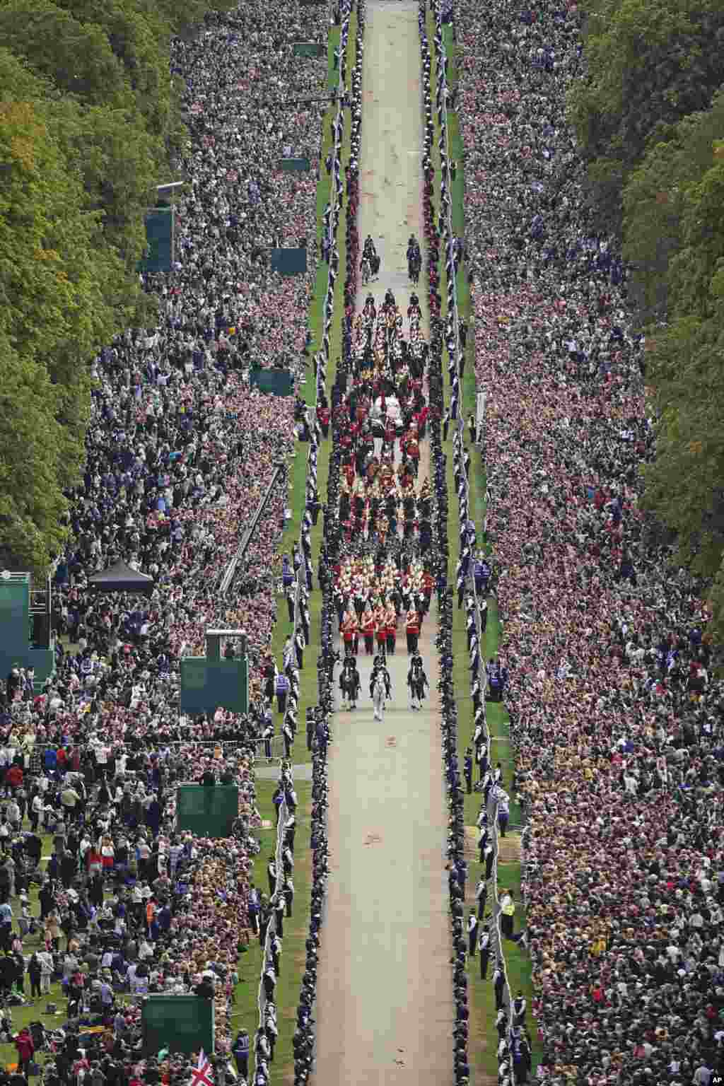 The Ceremonial Procession of the coffin of Queen Elizabeth travels down the Long Walk as it arrives at Windsor Castle for the Committal Service at St. George's Chapel, Sept. 19, 2022.