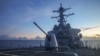 Arleigh Burke-class guided-missile destroyer USS Benfold (DDG 65), forward-deployed to the U.S. 7th Fleet area of operations, conducts underway operations in the South China Sea, in this handout picture released on July 13, 2022. 