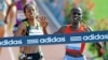 FILE - Runners are seen at the ADIDAS Grand Prix at Icahn Stadium on Randalls Island in New York, June 12, 2010.