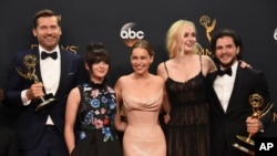 Members of the Game of Thrones cast celebrate their Emmy award in September, 2016.