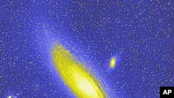 Andromeda is the nearest major galaxy to our own Milky Way Galaxy, and the diffuse light from Andromeda Galaxy is caused by the hundreds of billions of stars that compose it.