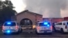 Louisiana State Fire Marshall vehicles are seen outside the Greater Union Baptist Church during a fire, in Opelousas, April 2, 2019, in this picture obtained from social media. 