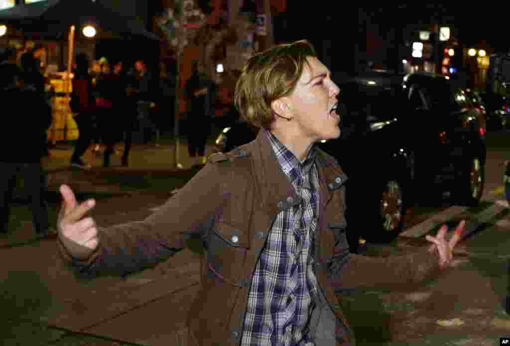 A person yells during a protest against President-elect Donald Trump, in Seattle's Capitol Hill neighborhood, Nov. 9, 2016.